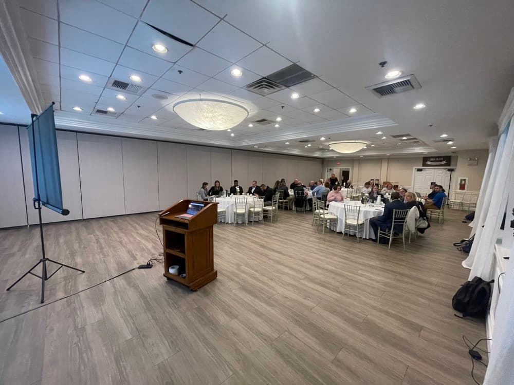 Dr. Jeff Bullock speaking on AI implementation